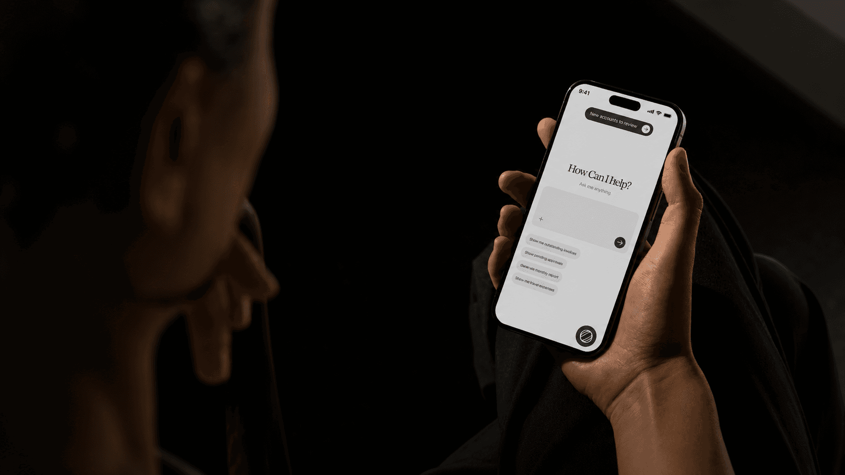 StartUp Factory — person using AI assistant on mobile